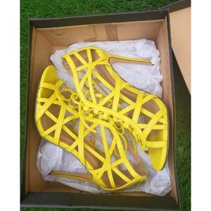 Yellow caged tie up heels